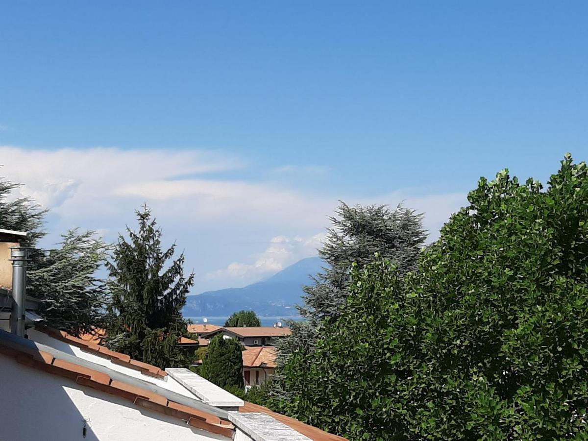Appartamento Genziana - Con Vista Piscina E Garage Sirmione Exterior photo